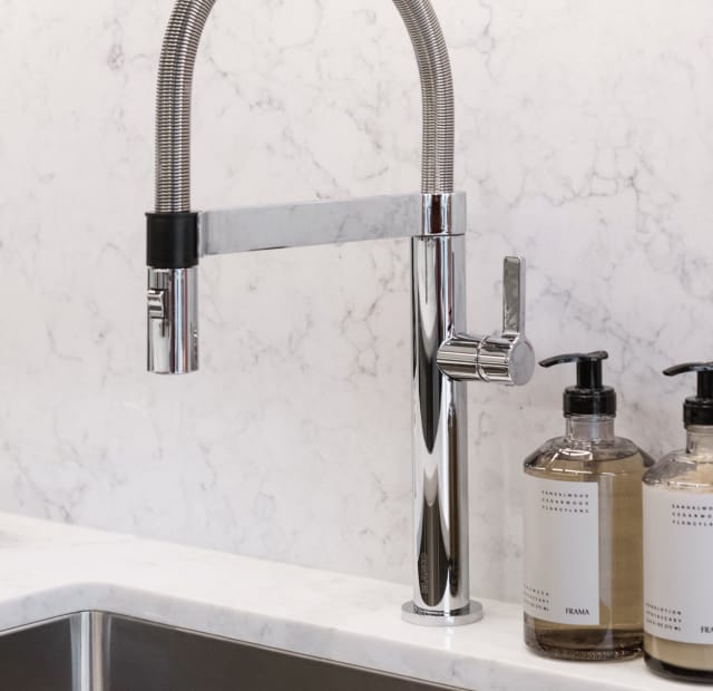 Blanco polished-chrome faucet with pull-down spray spout and magnetic hand spray holder